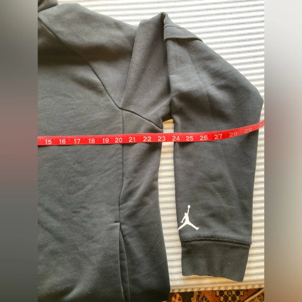Jordan Men’s Black Hoodie with Teal Graphic and Front Pockets, Size Large